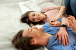 © Yakobchuk Olena - Young smiling couple are hugging each other at home