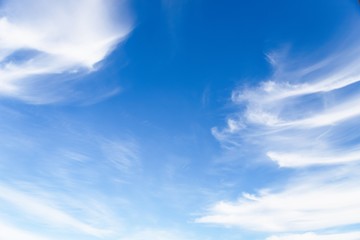Wall Mural - White cirrocumulus clouds in the blue sky. Beautiful sky background