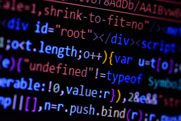 Wall Mural - macro of minified javascript file. computer programming source code for html website development.