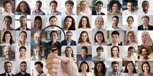Fotografía Male hr manager holding magnifying glass head hunting choosing finding new unique talent indian female candidate recruit among multiethnic professional people faces collage