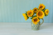 Sunflowers. Summer Bouquet In Crockery With Pastel Background.