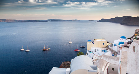 traditional white architecture over the Caldera, Aegean sea. Scenic travel background, Santorini