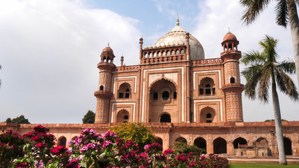 Wall Mural - safdarjung's tomb with a flower bed in the foreground at delhi