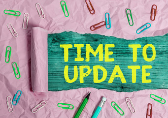 Wall Mural - writing note showing time to update. business concept for this is right moment to make something mor
