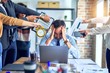 © Krakenimages.com - Group of business workers working together. Partners stressing one of them at the office