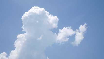Wall Mural - 4k Time lapse video blue sky with fluffy white clouds moving during the day time