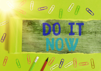 Wall Mural - Writing note showing Do It Now. Business concept for not hesitate and start working or doing stuff right away