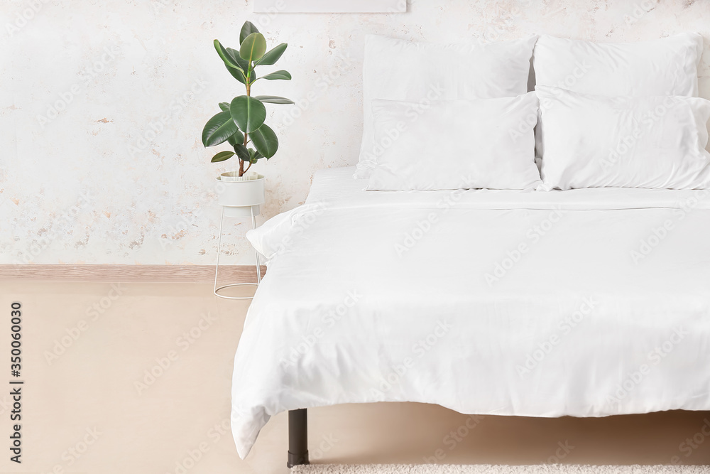 Interior of comfortable modern bedroom