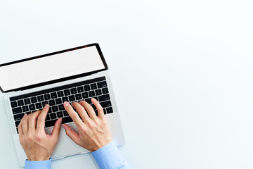 Aufkleber - Top view of laptop with blank display. Businessman using laptop on white background.