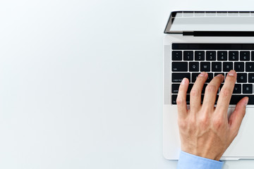 Aufkleber - Top view of laptop with blank display. Close up of businessman using laptop on white background.