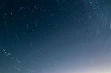 Wall Mural - Long exposure image showing star trails