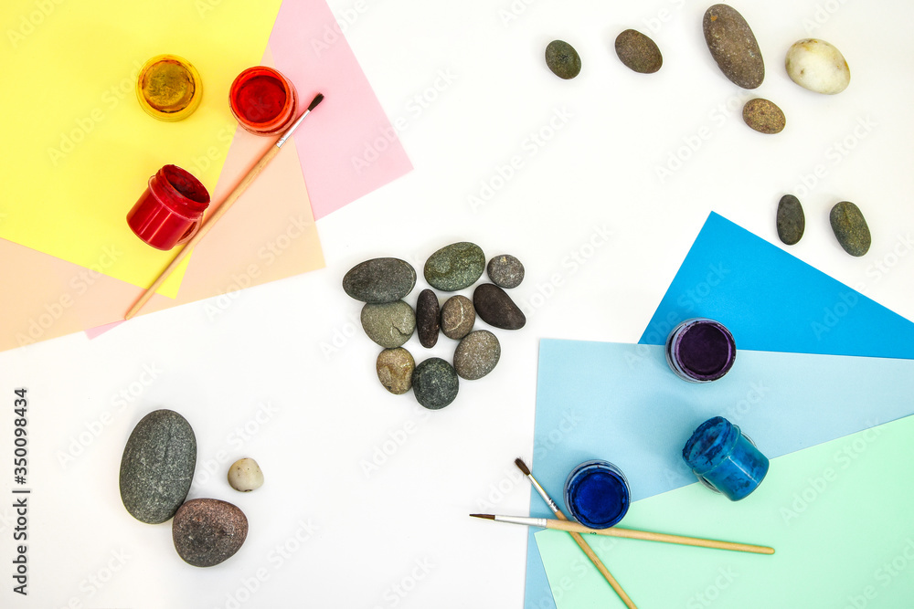 top view of tic tac toe game with stones marked with naughts and ...