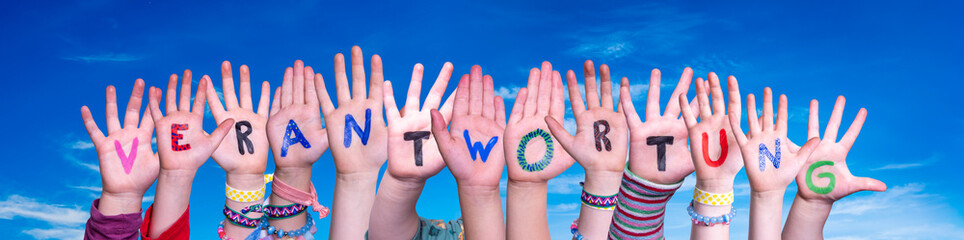 Wall Mural - Children Hands Building Colorful German Word Verantwortung Means Resposibility. Blue Sky As Background