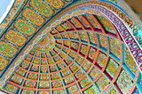 The main entrance to old soviet historical central bazaar Panjshanbe Bozor and beautiful decoration on the ceiling in Khujand in Tajikistan
