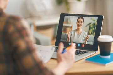 Man is using laptop pc for remote conversation