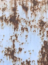 Worn Rusty Metal Texture Background. Baby Blue Paint Flaking And Cracking Texture