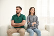 © New Africa - Stubborn man and woman with problems in relationship at home