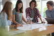© goodluz - group of students working on a wind project