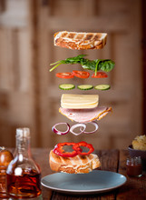Floating Ingredients Of A Ham And Cheese Salad Sandwich. The Individual Ingredients Of A Sandwich Paper To Magically Float Between 2 Slices Of Bread