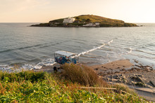 Sunset Over Burgh Island, Devon, England With Water Tractor