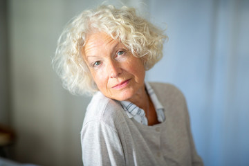 Wall Mural - Close up beautiful older woman staring