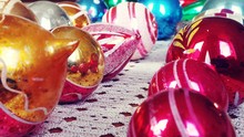 Various Christmas Baubles On Table