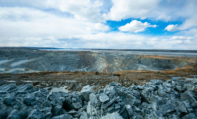 Poster - Open pit mining  work of excavators and dump trucks