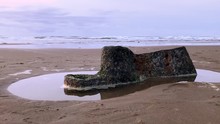 A Piece Of The Sujameco Shipwreck Exposed During Low Tide At Horsfall Beach Near Coos Bay, Oregon.