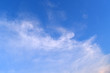 © Chuttapon - Sky blue background. Natural background.The sky with clouds and sunlight