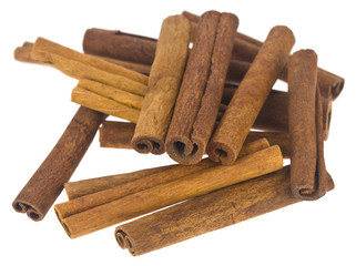 Poster - Cinnamon sticks isolated on a white background close-up.