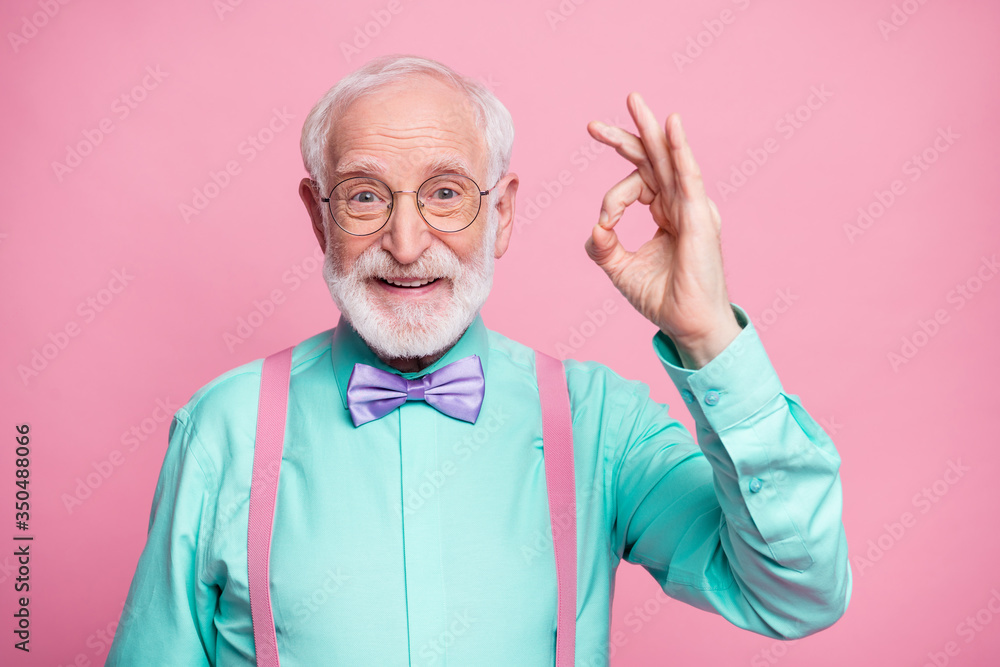 Portrait of positive cheerful old gentleman show okay sign decide choose perfect ads decisions choice wear good look outfit purple bow tie isolated over pastel color background - obrazy, fototapety, plakaty 