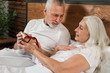 © FreepikCompany - Senior couple in bed on valentines day