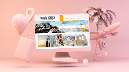 Minimal pink computer with travel agency on screen