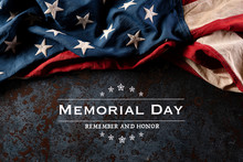 Happy Memorial Day. American Flags With The Text REMEMBER & HONOR Against A Black Stone Texture Background. May 25.