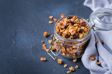 Wall Mural - Homemade granola muesli on a kitchen table