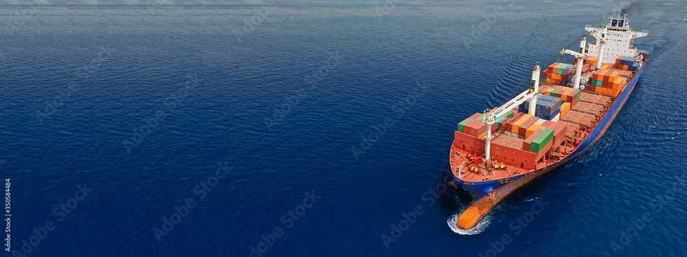 Aerial drone panoramic ultra wide photo of industrial container tanker ship cruising in open ocean deep blue sea	
 - obrazy, fototapety, plakaty 