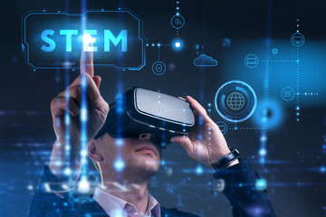business, technology, internet and network concept. young businessman working on a virtual screen of