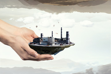 Industrial landscape with chimneys floating