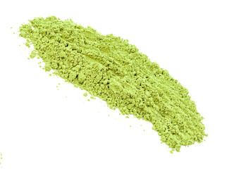 Green matcha powder on white background. Matcha made from finely ground green tea powder. Eat healthy because of high antioxidants.