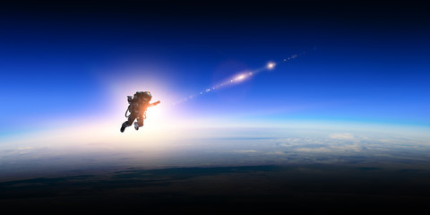 Wall Mural - astronaut in space on planet orbit.
