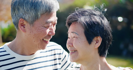 Wall Mural - Asian elderly couple smile