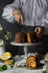 Wall Mural - Chocolate and pumpkin bundt cake and lemon zest