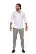 © studioloco - Young Handsome Man Is Standing Relaxed And Looking Away
