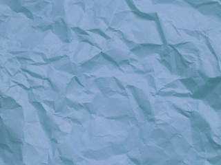 Wall Mural - Crumpled pastel blue paper texture background