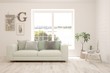 © AntonSh - White living room with sofa and summer landscape in window. Scandinavian interior design. 3D illustration