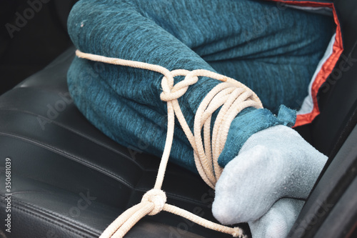 Cuadros en Lienzo the captive child in the car. Illegal theft and ransom of a child