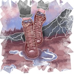 legs of a girl in boots on a background of mountains