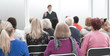 © ASDF - Audience of adult people listen to the speech of the lecturer