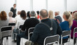 © ASDF - Audience of adult people listen to the speech of the lecturer