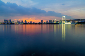 Wall Mural - Sunset with city skyline and the Rainbow Bridge, Tokyo